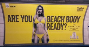 File photo dated 27/04/2015 of a Protein World advert displayed in an underground station in London which says "Are you beach body ready?'" as many of the posters have been defaced and a petition calling for their removal has gathered tens of thousands of signatures. PRESS ASSOCIATION Photo. Issue date: Tuesday April 28, 2015. See PA story HEALTH Body. Photo credit should read: Catherine Wylie/PA Wire